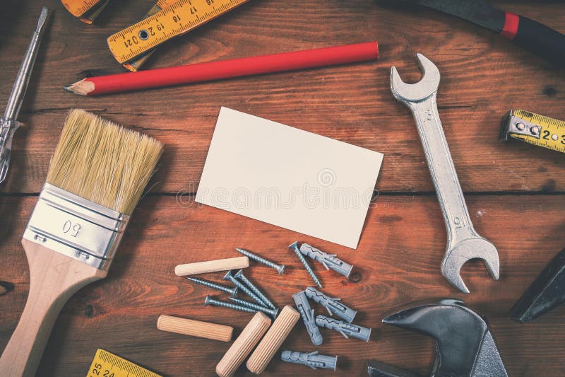 Réparation à la maison de services de bricoleur - carte de visite professionnelle vierge de visite avec des outils de constructio photographie stock