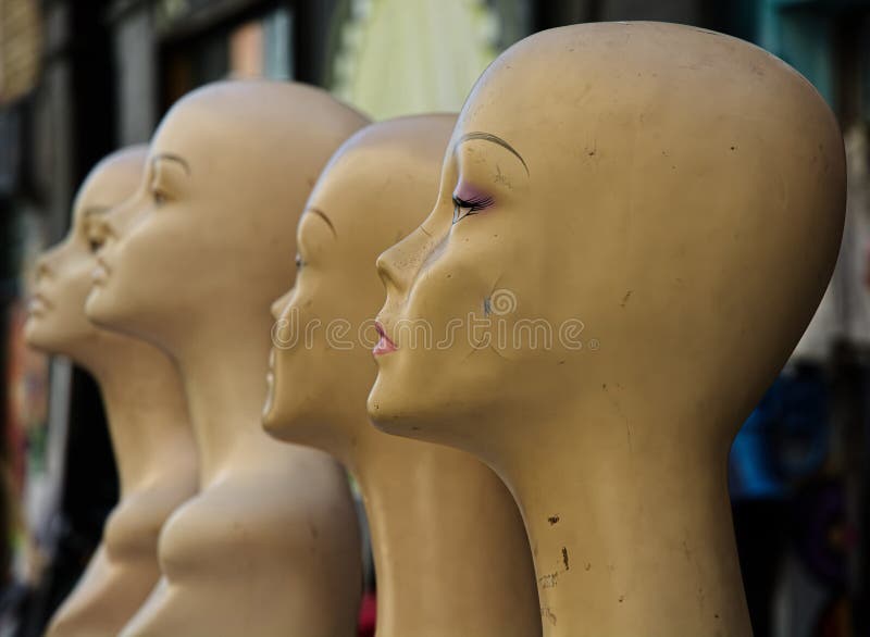 A line of attractive vintage and slightly damaged female mannequins used in the fashion industry up for auction. A line of attractive vintage and slightly damaged female mannequins used in the fashion industry up for auction