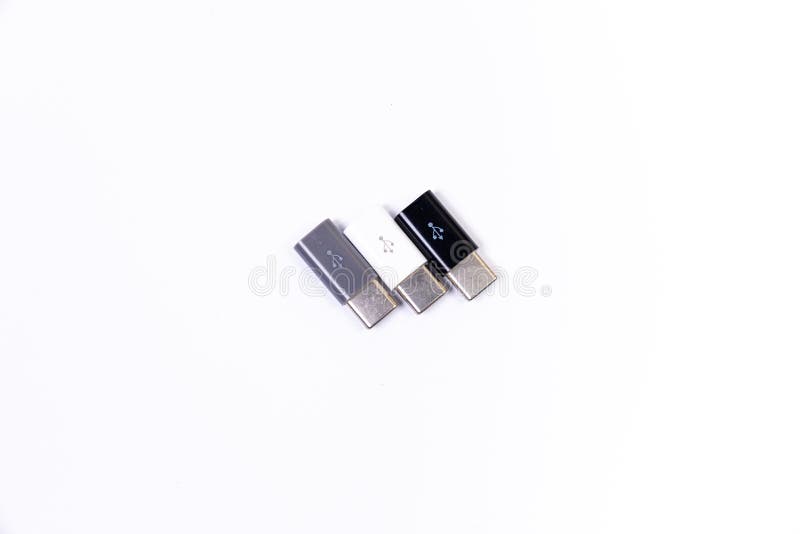 USB Type C adapter or hub with various accessories - pendrives, hdmi, ethernet, VGA DP HDMI, cables. various converter cables for computers and smartphones isolated on white. USB Type C adapter or hub with various accessories - pendrives, hdmi, ethernet, VGA DP HDMI, cables. various converter cables for computers and smartphones isolated on white