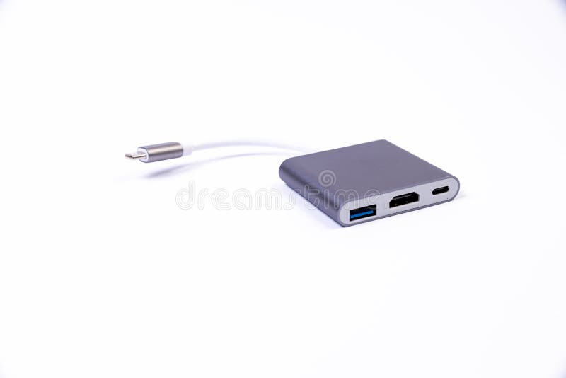 USB Type C adapter or hub with various accessories - pendrives, hdmi, ethernet, VGA DP HDMI, cables. various converter cables for computers and smartphones isolated on white. USB Type C adapter or hub with various accessories - pendrives, hdmi, ethernet, VGA DP HDMI, cables. various converter cables for computers and smartphones isolated on white