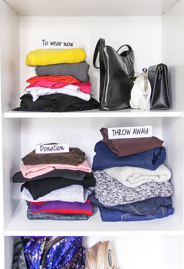 Different clothes in home wardrobe with paper notes. Small space organization. Vertical storage, interior, mess, pants, australian, beige, belt, built, cleaning, closet, contemporary, cupboard, disorder, drawer, female, fly, lady, hang, house, huge, large, lavish, maintaining, melamine, neat, pull-out, racks, residence, roll-out, saving, shelving, shirt, skirts, spacious, store, stylish, tidy, tie, walk, warm, apparel, background. Different clothes in home wardrobe with paper notes. Small space organization. Vertical storage, interior, mess, pants, australian, beige, belt, built, cleaning, closet, contemporary, cupboard, disorder, drawer, female, fly, lady, hang, house, huge, large, lavish, maintaining, melamine, neat, pull-out, racks, residence, roll-out, saving, shelving, shirt, skirts, spacious, store, stylish, tidy, tie, walk, warm, apparel, background
