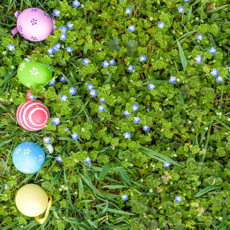 Different color Easter Eggs in a child`s hands- egg hunt. Different color Easter Eggs in a child`s hands- egg hunt.