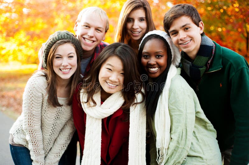 Diverse group of friends smiling together. Diverse group of friends smiling together