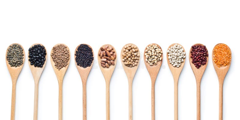 Różnorodni wysuszeni legumes w drewnianych łyżkach obrazy royalty free Różnorodni wysuszeni legumes w drewnianych łyżkach obrazy royalty free