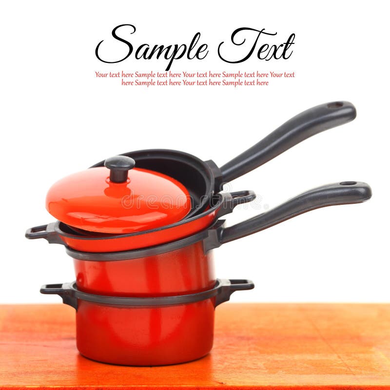 Röd cookwareuppsättning royaltyfri bild Röd cookwareuppsättning royaltyfri bild