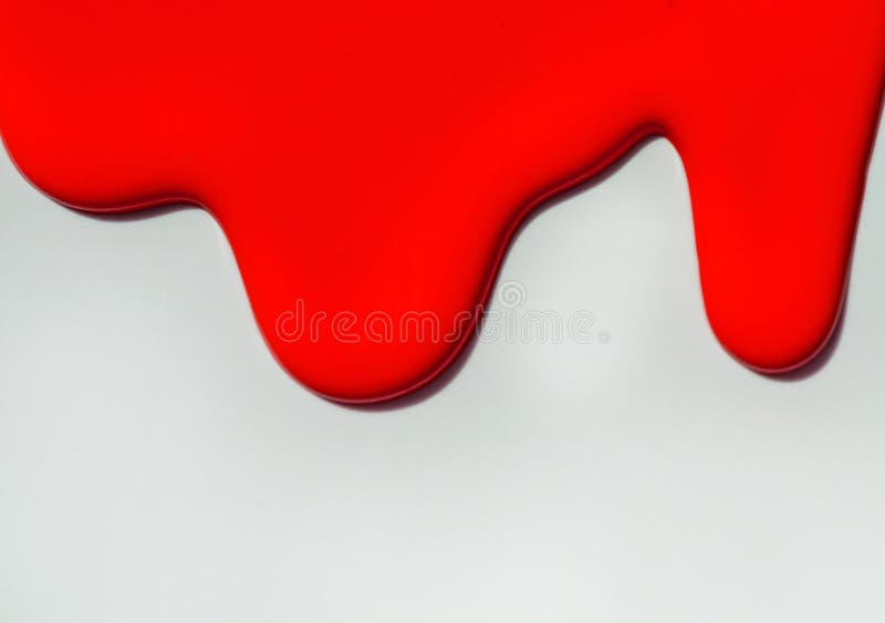 Red paint streaks on white background.Copy space. Red paint streaks on white background.Copy space.