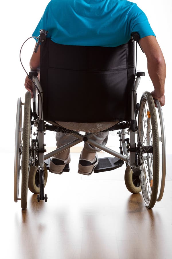 Back view of disabled patient on isolated white background. Back view of disabled patient on isolated white background