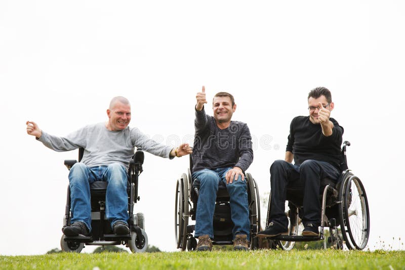 Disabled Happy friends with thumbs up. Disabled Happy friends with thumbs up.