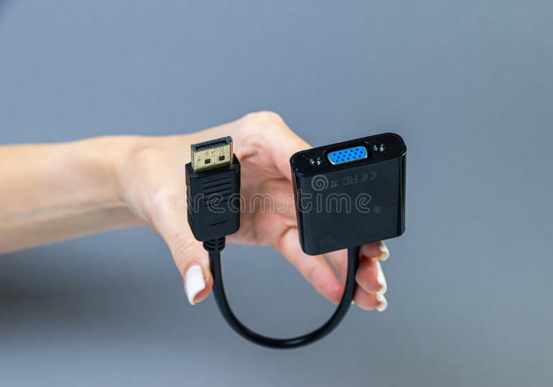 USB Type C adapter or hub with various accessories - pendrives, hdmi, ethernet, memory card, cables. Hands holding various converter cables for computers and smartphones. USB Type C adapter or hub with various accessories - pendrives, hdmi, ethernet, memory card, cables. Hands holding various converter cables for computers and smartphones