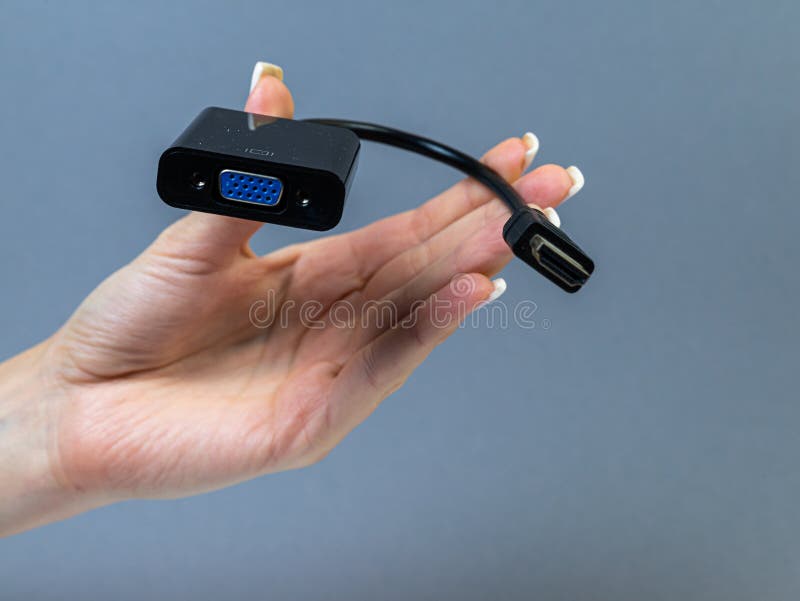 USB Type C adapter or hub with various accessories - pendrives, hdmi, ethernet, memory card, cables. Hands holding various converter cables for computers and smartphones. USB Type C adapter or hub with various accessories - pendrives, hdmi, ethernet, memory card, cables. Hands holding various converter cables for computers and smartphones