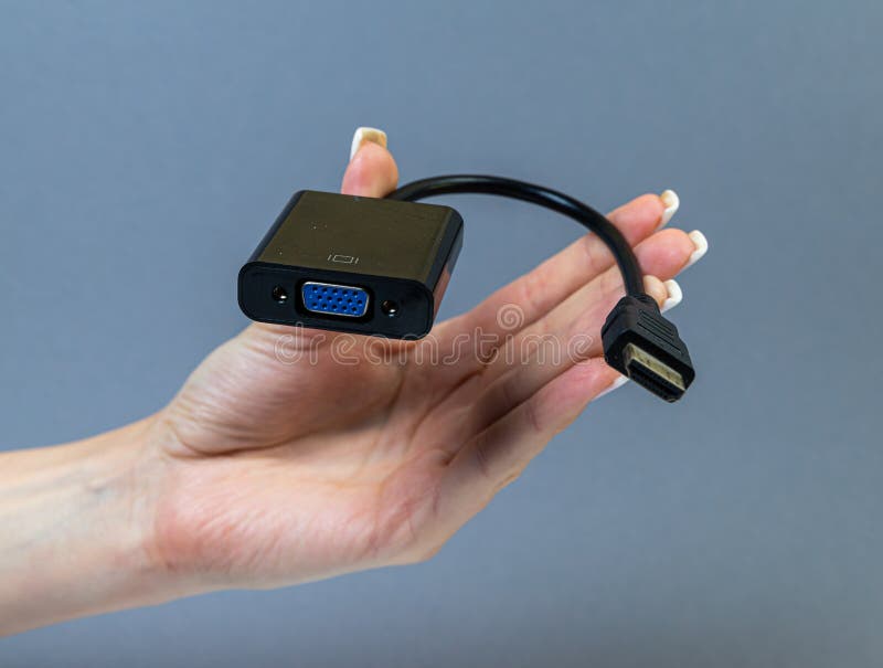 USB Type C adapter or hub with various accessories - pendrives, hdmi, ethernet, memory card, cables. Hands holding various converter cables for computers and smartphones. USB Type C adapter or hub with various accessories - pendrives, hdmi, ethernet, memory card, cables. Hands holding various converter cables for computers and smartphones