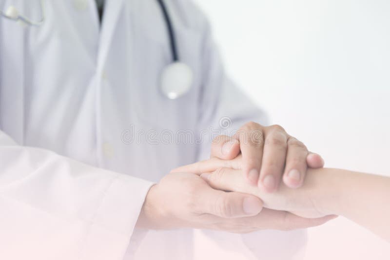 Ręka doktorski reasekurujący jej żeńskiego pacjenta, doktorski cierpliwy samochód obrazy royalty free Ręka doktorski reasekurujący jej żeńskiego pacjenta, doktorski cierpliwy samochód obrazy royalty free
