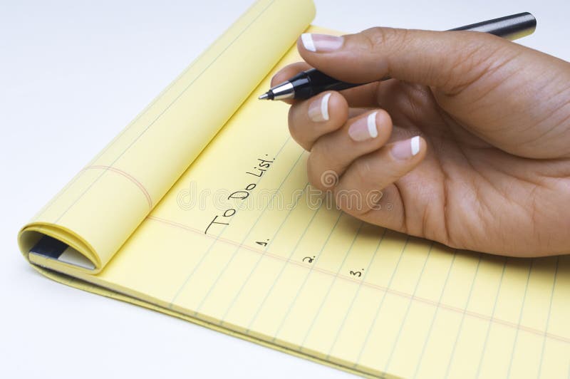 Ręki Writing lista zadania Robić Na Notepad