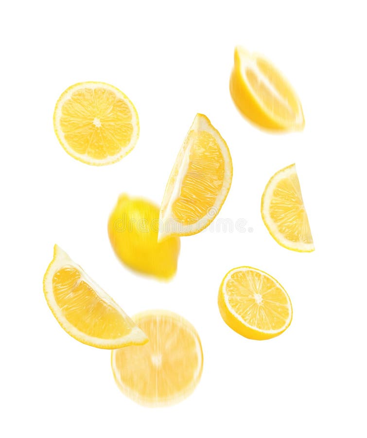 Cut fresh lemons falling isolated on white background. Cut fresh lemons falling isolated on white background