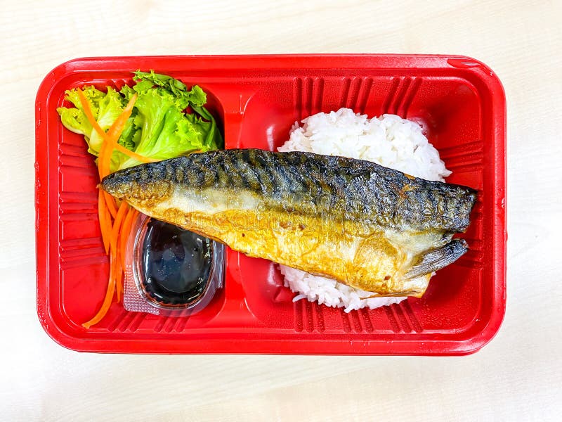 Saba Fish Grilled with Salad in the Food Container Stock Photo Image