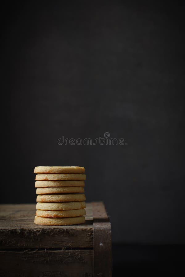 Sable Breton biscuits stacked on a wood box