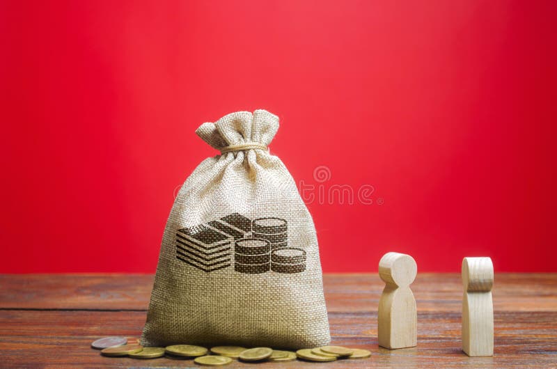 Money bag and two wooden figures of people. Business and finance concept. Businessmen are discussing the company`s profit. Search for sources of funding. Business planning. Revenue analysis. Money bag and two wooden figures of people. Business and finance concept. Businessmen are discussing the company`s profit. Search for sources of funding. Business planning. Revenue analysis
