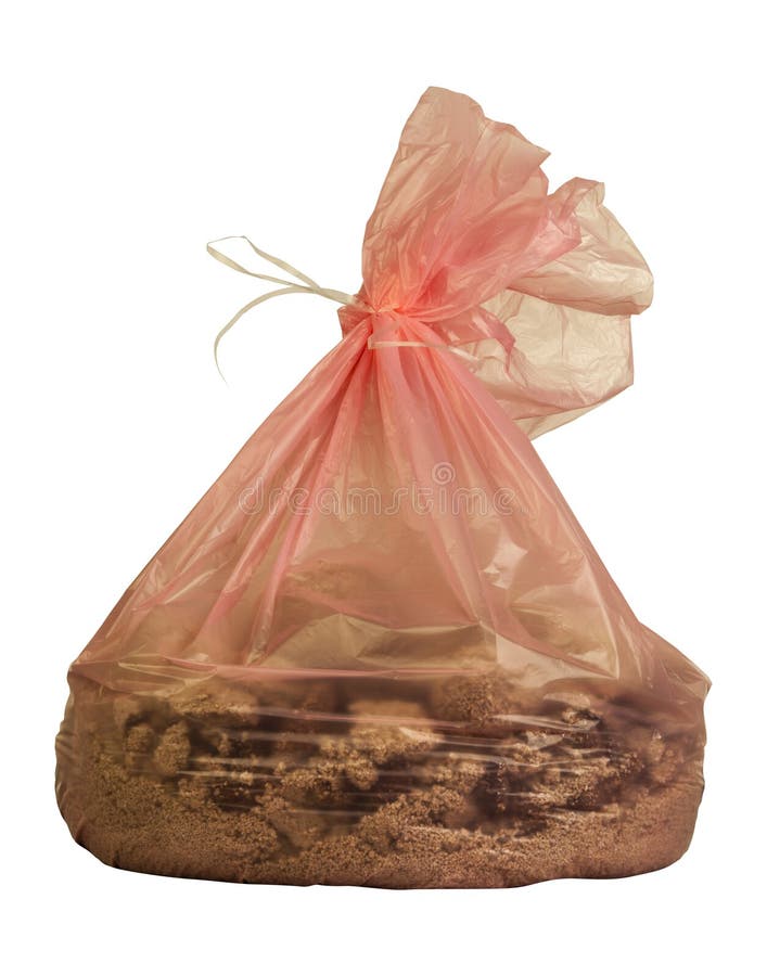 A pink closed plastic bag with inside sand the cat litter with droppings inside. PNG available. A pink closed plastic bag with inside sand the cat litter with droppings inside. PNG available