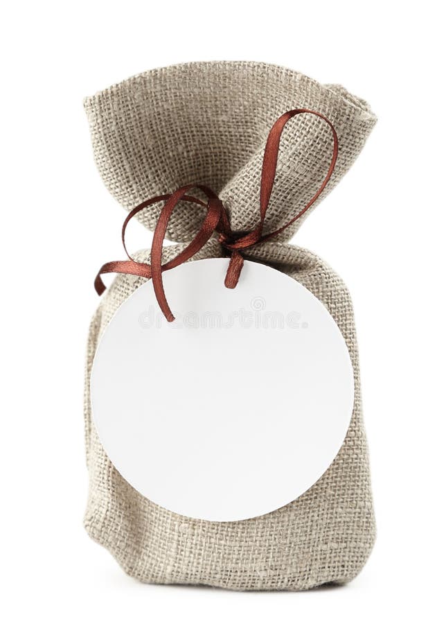 sac de tissu avec un cadeau photos libres de droits sac de tissu avec un cadeau photos libres de droits