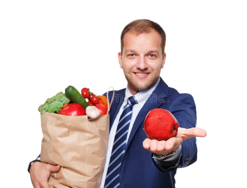 Sac heureux de prise d'homme avec la nourriture saine, acheteur d'épicerie d'isolement photos libres de droits Sac heureux de prise d'homme avec la nourriture saine, acheteur d'épicerie d'isolement photos libres de droits