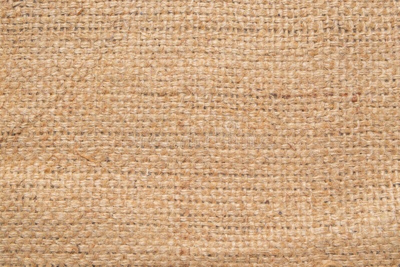 Burlap fabric patch, brown sack cloth, close up detail of natural material  fabric texture for the background Stock Photo