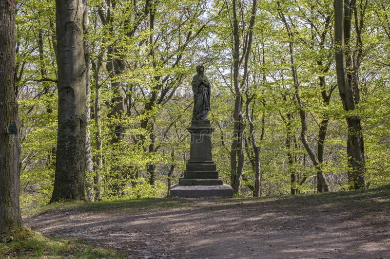 Old historic chestnut alley in Chotebor during spring season, trees in two rows, romantic scene