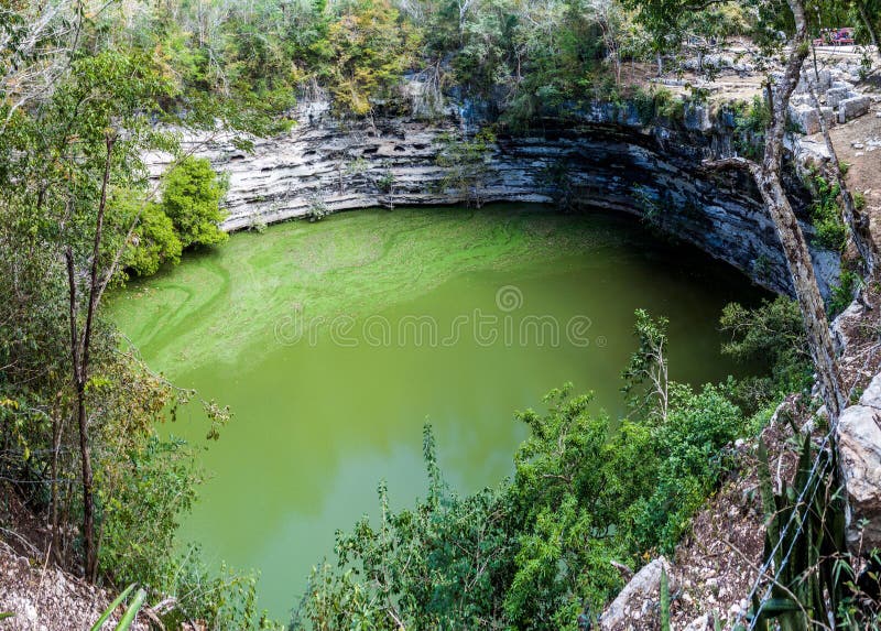 Sacred cenote at the archeological site Chichen Itza, Mexi royalty free stock photography
