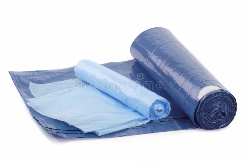 Roll of blue trash bags on bright background. Roll of blue trash bags on bright background