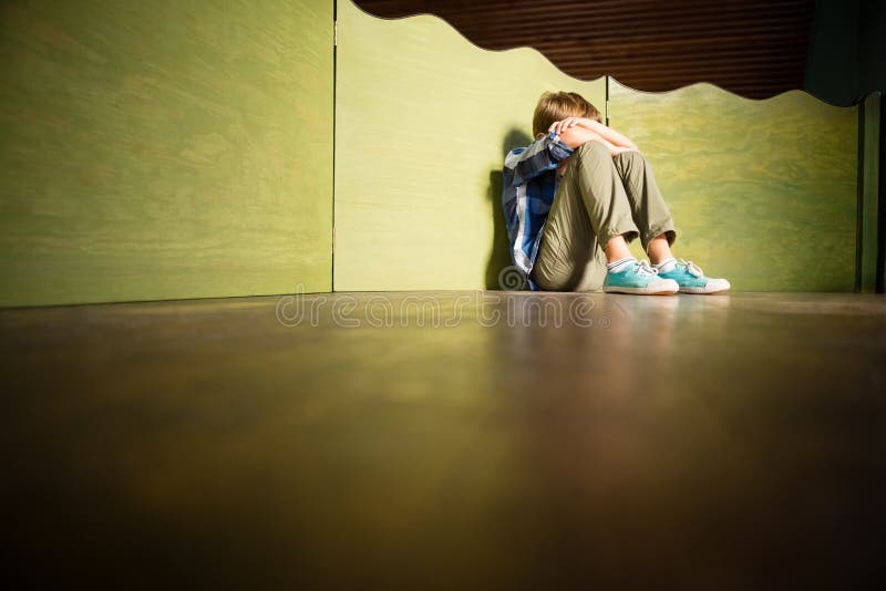 Sad Boy Sitting with Head Down Stock Photo Image of seclusion