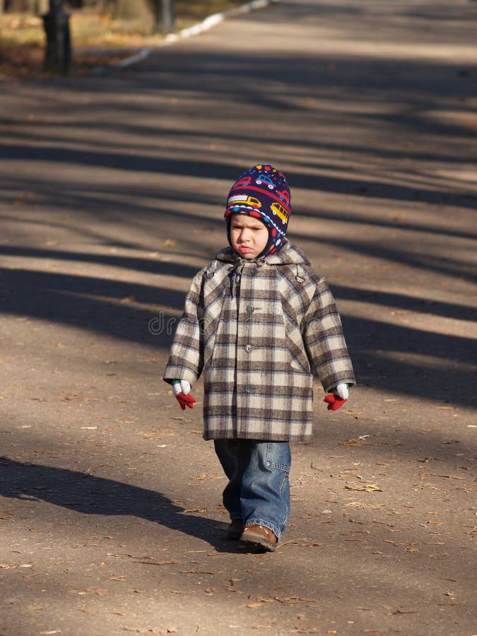 Sad boy walking stock photo. Image of boys, people, activity - 3499814