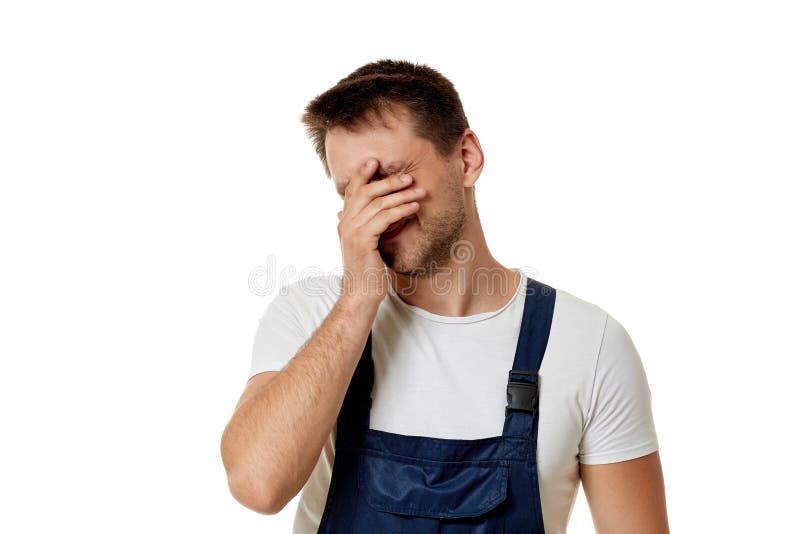 Sad caucasian worker repairman stock photo