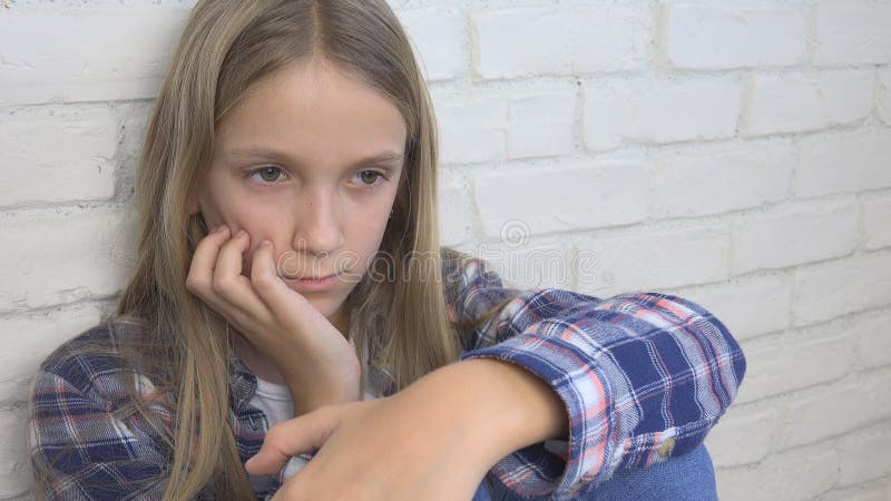 Sad Child, Unhappy Kid, Sick Ill Girl in Depression, Stressed Thoughtful Person stock photo Sad Child, Unhappy Kid, Sick Ill Girl in Depression, Stressed Thoughtful Person stock photo