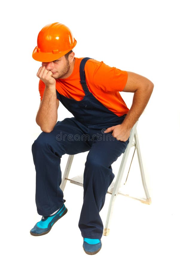 Sad constructor worker sitting and waiting on step ladder isolated on white background. Sad constructor worker sitting and waiting on step ladder isolated on white background