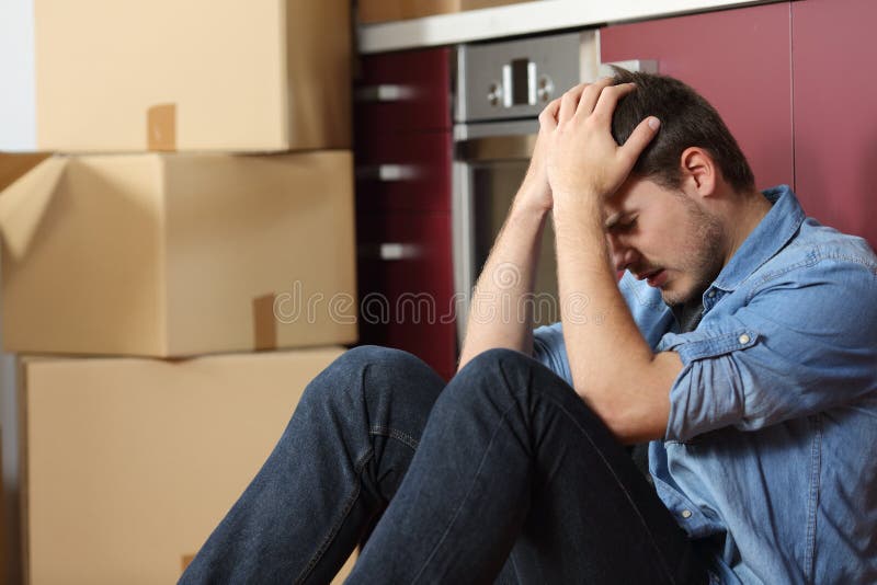 Sad evicted man worried moving house