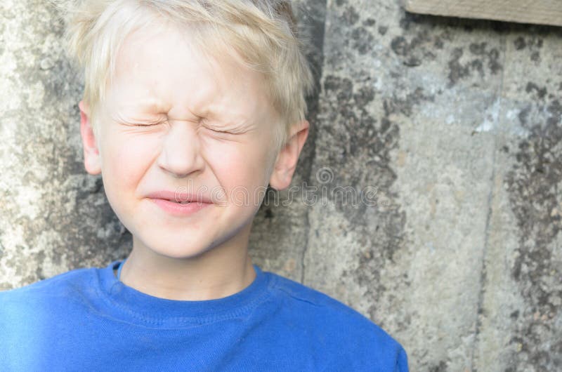 The sad face of a beggar boy, emotion. royalty free stock images The sad face of a beggar boy, emotion. royalty free stock images