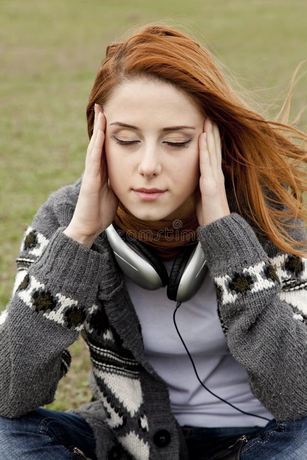 Sad girl with headphones