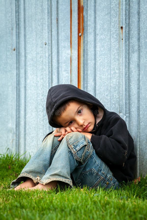 Sad Homeless Boy stock image. Image of emotion, earth - 145212633