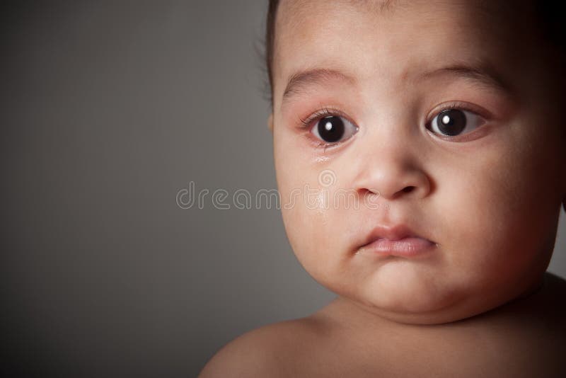 Sad indian baby boy