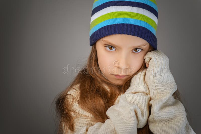 Sad Little Girl in Knitted Cap Stock Photo - Image of lonely, beauty ...