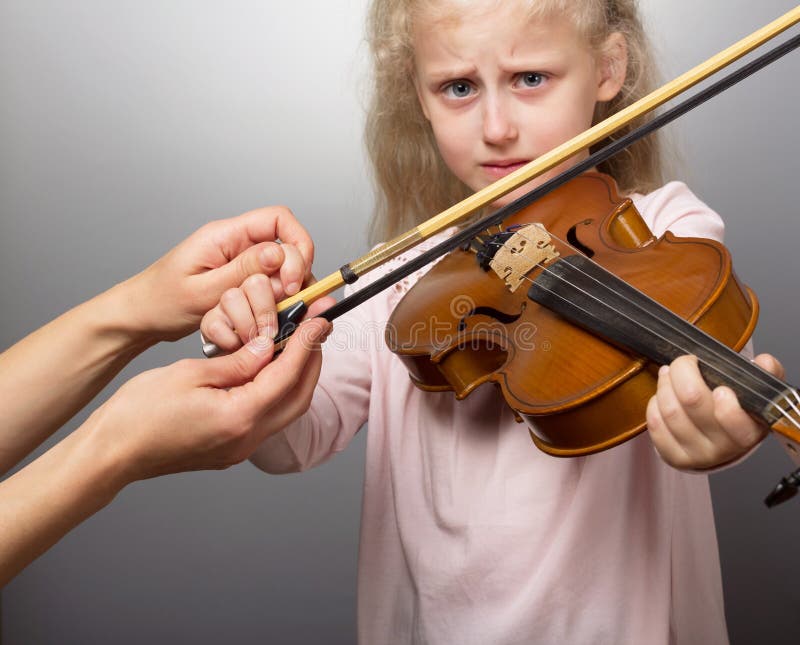 Sad Little Girl Learns To Play Violin, Upset, and Unwillingness To Learn  Stock Photo - Image of happy, girl: 139905784