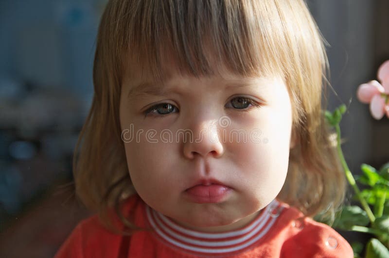 Sad little girl portrait crying closeup looking at camera indoor, Depression, loneliness, stress or fatigue concept royalty free stock image Sad little girl portrait crying closeup looking at camera indoor, Depression, loneliness, stress or fatigue concept royalty free stock image