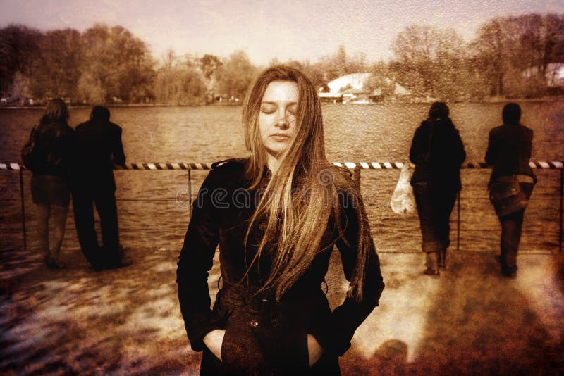 Sad lonely solitary depressed young woman royalty free stock photography
