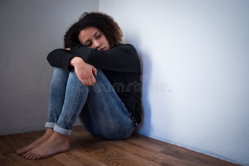 Sad and lonely young girl depressed royalty free stock photography