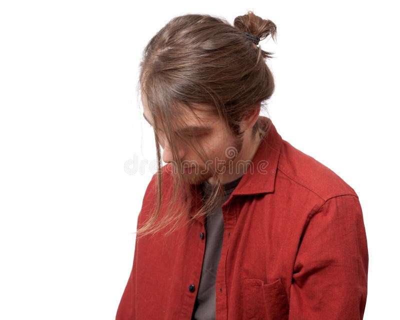 Sad man with a hairstyle looking down stock photography Sad man with a hairstyle looking down stock photography