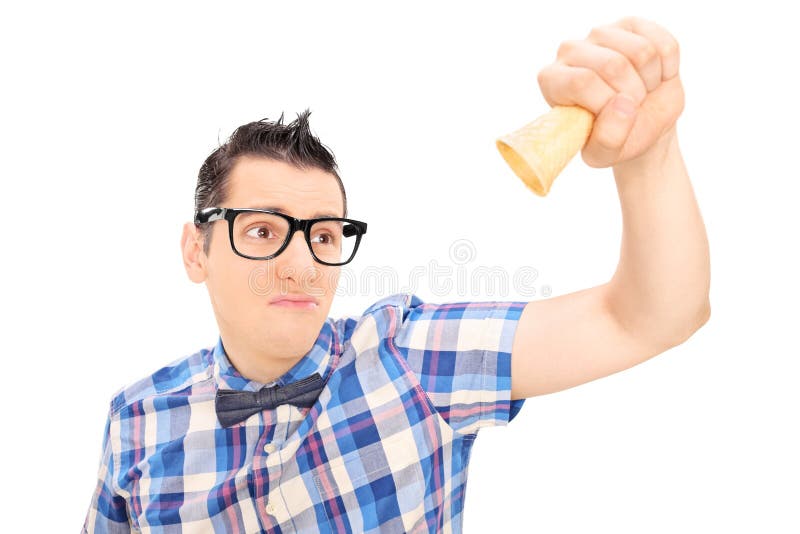 Sad man holding an empty ice cream cone