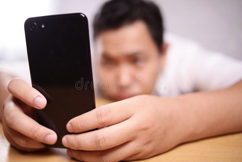 Sad Man With Smart Phone Worried Expression