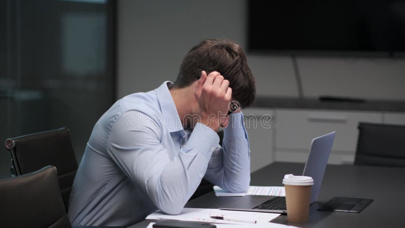 Sad Man Working at Desk in the Office stock footage