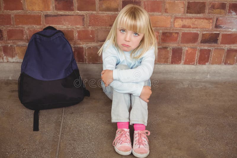 Sad Pupil Sitting Alone on Ground Stock Image - Image of melancholy ...