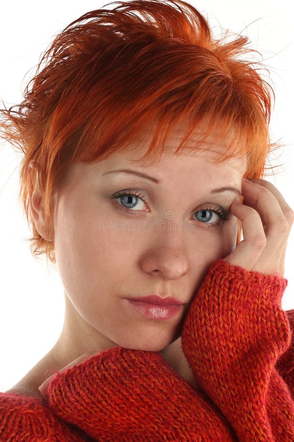 Sad red haired woman