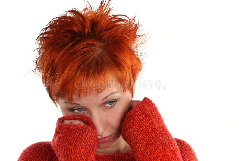Sad red haired woman